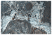Light-Toned Outcrops in Plains between Melas and Candor Regions