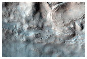 Pits at the Head of Dao and Niger Valles as Seen in MOC Image E04-00791