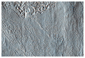 Rocky Outcrops on Crater Rim and Floor