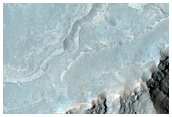 Light-Toned Layering along Plains Adjacent to Melas Chasma