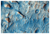 Dark Spot and Cracked Crater Floor in THEMIS Image