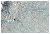 Fresh Crater on Ejecta of Larger Well-Preserved Crater