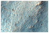 Ramparts of Layered Ejecta from Impact Crater in Hesperia Planum
