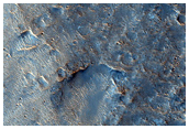 Possible Olivine-Rich Terrain from Impact on Herschel Crater Floor
