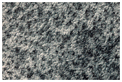 Possible Hydrate-Rich Terrain in Promethei Planum