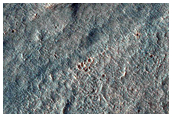 Braided Forms West of Hadriaca Patera