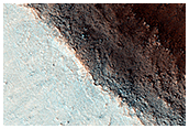 Channel Carved Into Scarp within Isidis Planitia