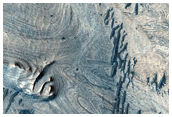 Light-Toned Layered Material in Melas Chasma