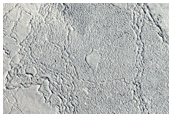 Interaction between Platy-Ridged Lava and Older Hill