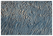 Rocky Units on Crater Floor in East Promethei Terra