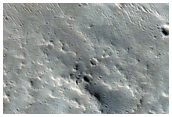 Arabia Terra Crater or Escarpment Impact Processes