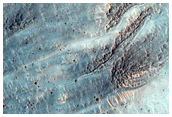 Gullied 35 Kilometer Diameter Impact Crater in Promethei Terra