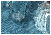 Pits in Hydrae Chasma