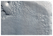 Layers in Floor of Small Crater