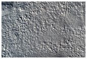 Lineated Valley Fill and Nearby Concentric Crater Fill