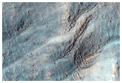 Gullied 35 Kilometer Diameter Impact Crater in Promethei Terra