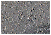 Wind Streak Monitor Site as Seen in MOC Images M01-00326 and E16-01627