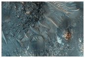 Tyrrhena Terra Crater with Central Uplift and Hydrated Minerals