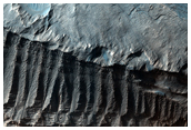 Ridges and Layered Deposits Near Capri Mensa