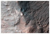 Outcrops of Light-Toned Materials Exposed in Highlands Crater Wall