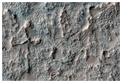 Southern Highlands High Thermal Inertia and Spectrally Distinct Materials