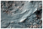 Streamlined Landforms on Terraces of Ritchey Crater