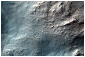 Eastern Rim of Fresh 9-Kilometer Diameter Impact Crater