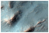 Central Peak and Interior of a Well-Preserved 16-Kilometer Diameter Crater