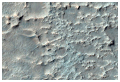 Basin North of Ladon Valles with Possible Clay-Rich Terrain
