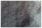 Hydrated and Unaltered Mineralogy in North Plains Crater