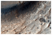 Light Toned Outcrops in Trouvelot Crater
