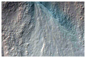Gullies Below Resistant Ridge of Rock