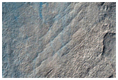 Perplexing Landforms in Beloha Crater