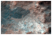 Central Peak of 70-Kilometer Diameter Impact Crater in Terra Sabaea
