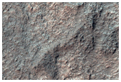Excellent Exposure of Light-Toned Bedrock West of Terby Crater