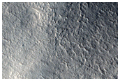 Nilosyrtis Mensae Fretted Terrain in the Northern Plains Transition Area