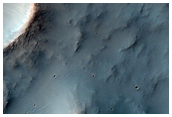 Possible Kaolinite in Terra Sirenum Crater Ejecta