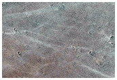 Candidate New Impact Site Formed Between May 2006 and July 2009