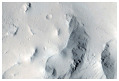 Central Peak of Impact Crater Northwest of Tharsis Region