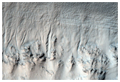 Gullies on Sun-Facing Crater Slope