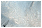 Drainage Off a Large Terrace Pond in Southern Mojave Crater