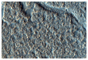 Young Fluvial Valleys on Floor of Lyot Crater