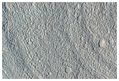 Lineated Valley Floor Material in the Acheron Fossae Region