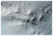 Bedrock Exposed by Impact Crater