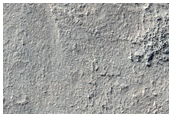 Possible Small-Scale Tributary into Reull Vallis