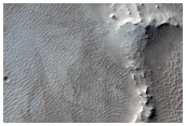 Well-Preserved Crater in Tharsis Region Lavas