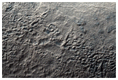 Massif on Banded and Fretted Terrain in Western Hellas Planitia