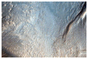 Drainage Off a Large Terrace Pond in Southern Mojave Crater