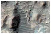 Remnant Mantiling Deposit in Millochau Crater