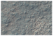 Bedrock Exposures in Wall and Floor of Impact Crater